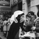 Lily Tomlin as “Red Cross Worker”. Handing out coffee and donuts to fans waiting in line to buy tickets to “Appearing Nitely” at the Biltmore. Young Judith Beasley “Stay Put” hair commercial from Emmy award winning special.  © 2015 Lily Tomlin. All Rights Reserved.