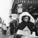 Lily Tomlin as “Red Cross Worker”. Handing out coffee and donuts to fans waiting in line to buy tickets to “Appearing Nitely” at the Biltmore. Young Judith Beasley “Stay Put” hair commercial from Emmy award winning special.  © 2015 Lily Tomlin. All Rights Reserved.